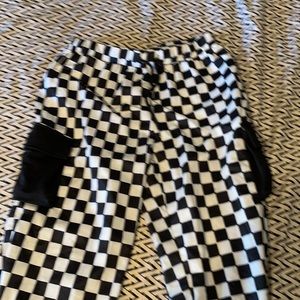 Black and white checkered pants with black pockets